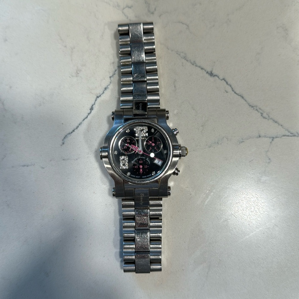 RENATO woman’s watch stainless steel diamond pave stones at eight and 12